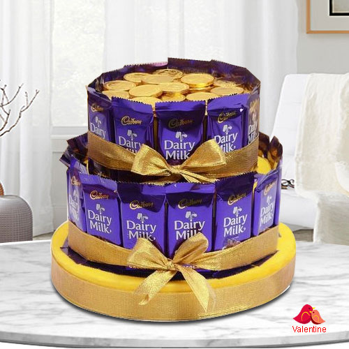 Exceptional Tower Arrangement of Cadbury Dairy Milk with Gold Coin Chocolates