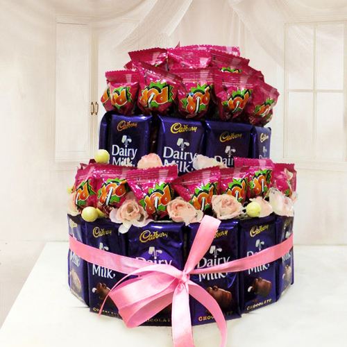 Arrangement of Cadbury Dairy Milk with Lollipops