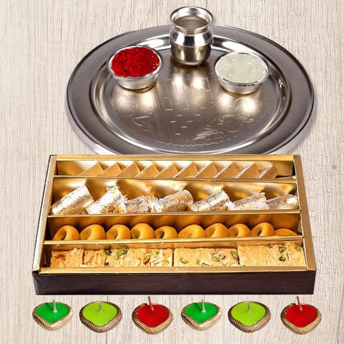 Silver Puja Thali Diya N Haldirams Assorted Sweets.