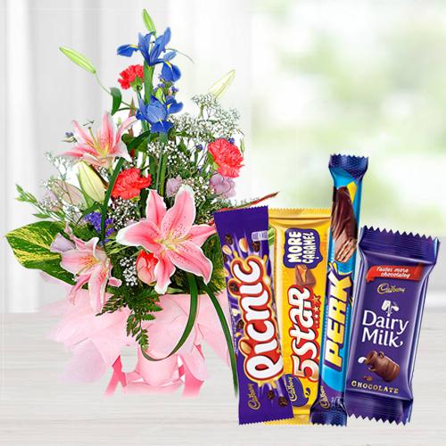 Seasonal Flowers Arrangement with Assorted Cadbury Chocolates