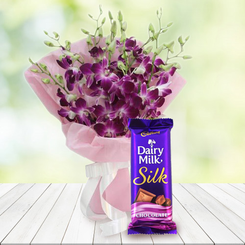 Gorgeous Bouquet of Orchids with Cadbury Dairy Milk Silk