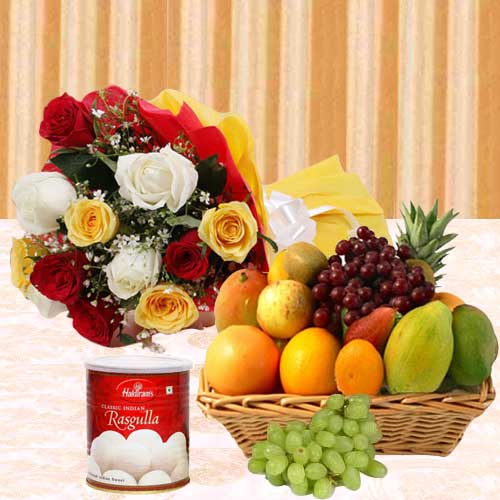 Delightful Mixed Fruits Basket with Mixed Roses Bouquet and Haldirams Rasgulla
