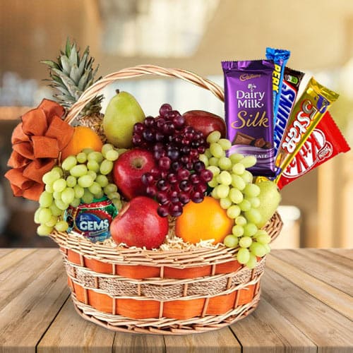 Pleasurable Chocolates with Mixed Fruits in a Basket