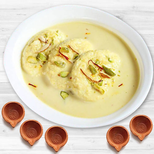 Delicious Ras malai with Beautiful Diyas