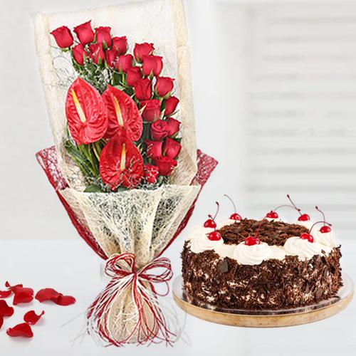 Captivating Red Roses n Anthodium Bouquet with Black Forest Cake