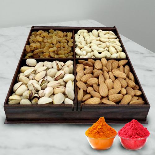 Nice Wrapped Gift Box containing  Mixed Dry Fruits i.e. Raisin Pistas Cashews Almonds Wallnuts with free Gulal/Abir Pouch. 
