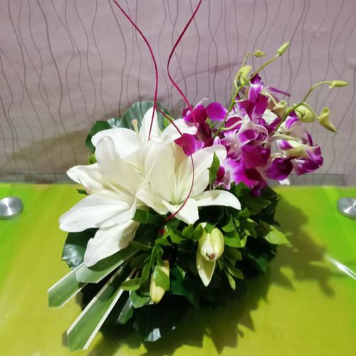 Exotic Lilies N Orchids Basket Arrangement