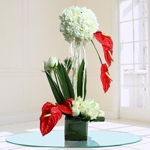 Remarkable Assorted Flowers Arrangement in Glass Vase