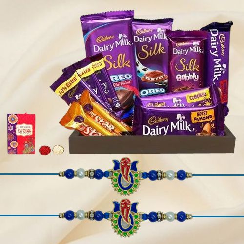 Classic Ganesh Metal Rakhi with Cadbury Chocolate Hamper