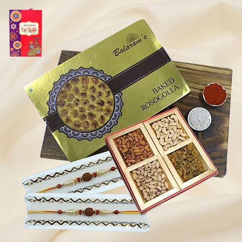 Tasty Balaram Mullicks Rasgulla with Assorted Dry Fruits N Classy Rakhi Pair